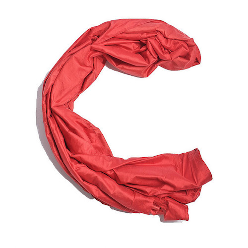 red silk arranged in C shape