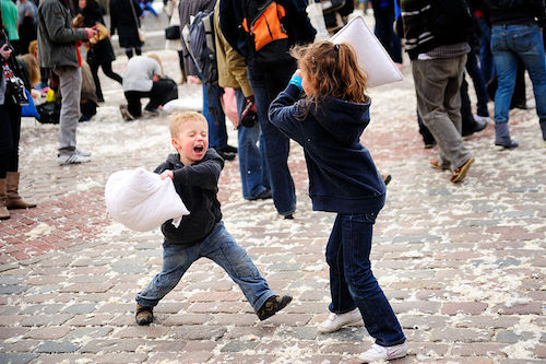pillow fighting children from city event in Warsaw