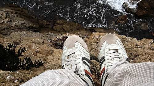 photo of feet on cliff edge