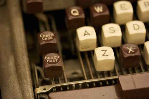 close up photo of upper & lowercase keys on antique typewritter