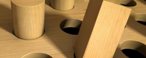 close-up photo of a square peg in round hole
