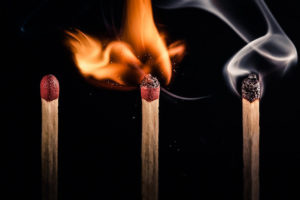 three matches: unlit, burning, and burnt. 